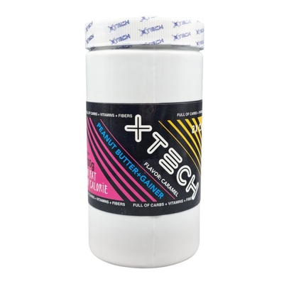 کره بادام زمینی ایکس تک حاوی گینر طعم کارامل ۱۱۰۰ گرمی