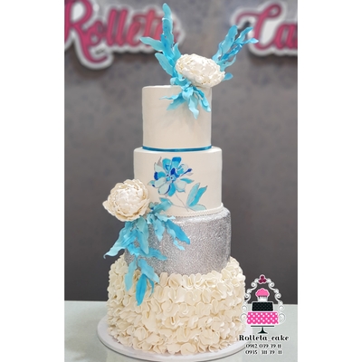 Beautiful wedding cake With white and ocean blue colors