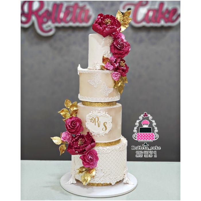 Wedding and engagement fondant cake with sugar red flower