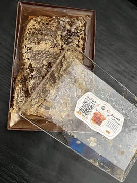 عسل نیم کیلویی موم‌دار طبیعی و خالص